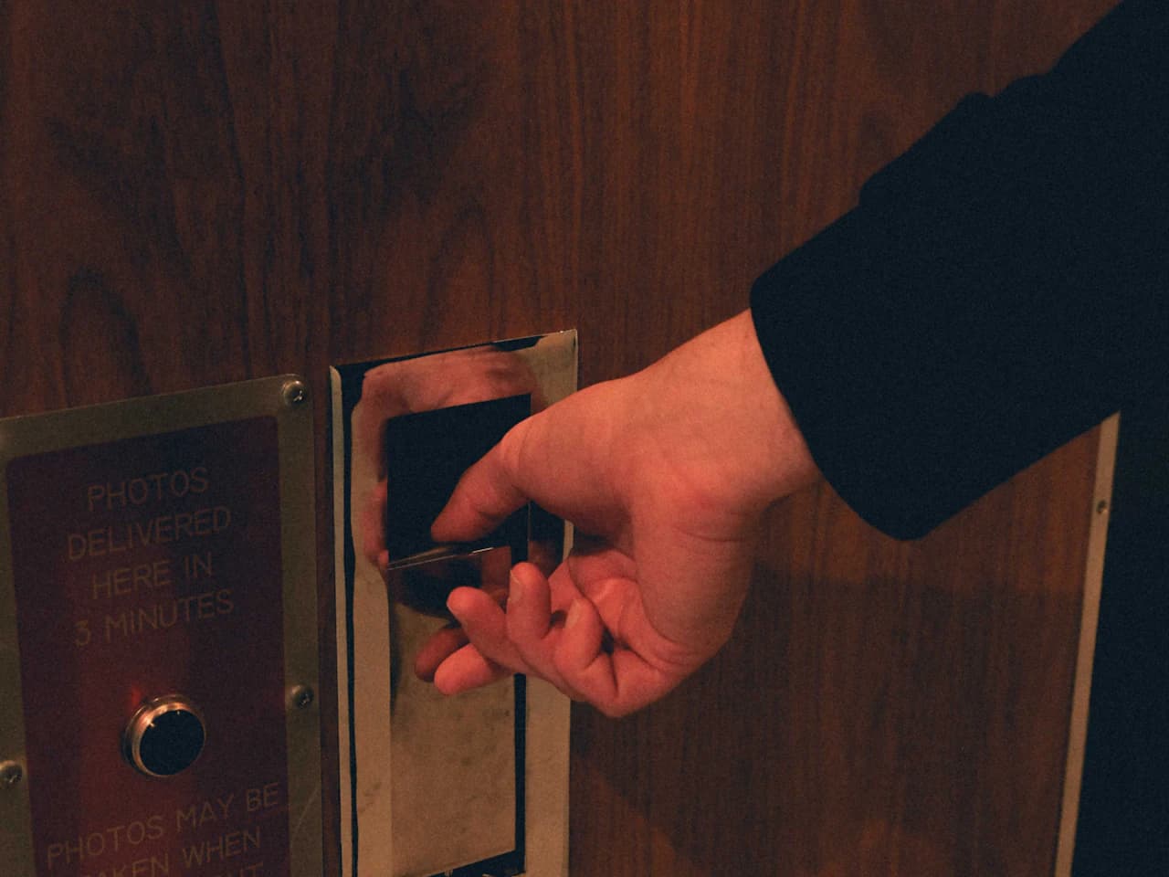 Person reaching for a locked door handle — describing a locksmith need